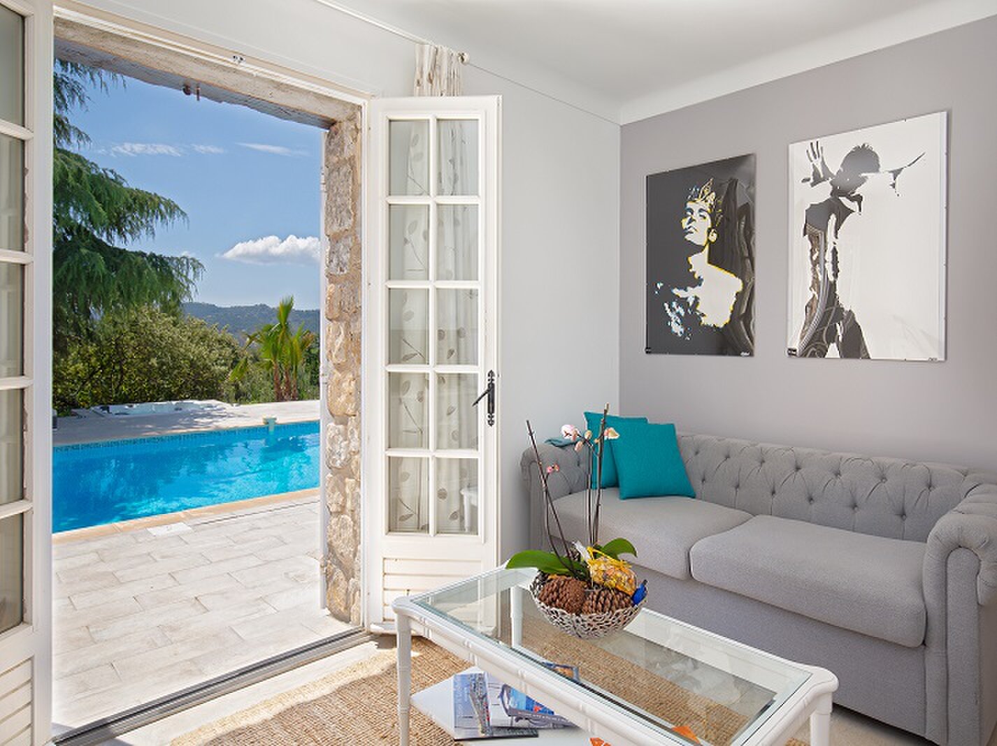 The lounge in the Bardot room, opening onto the pool terrace.
