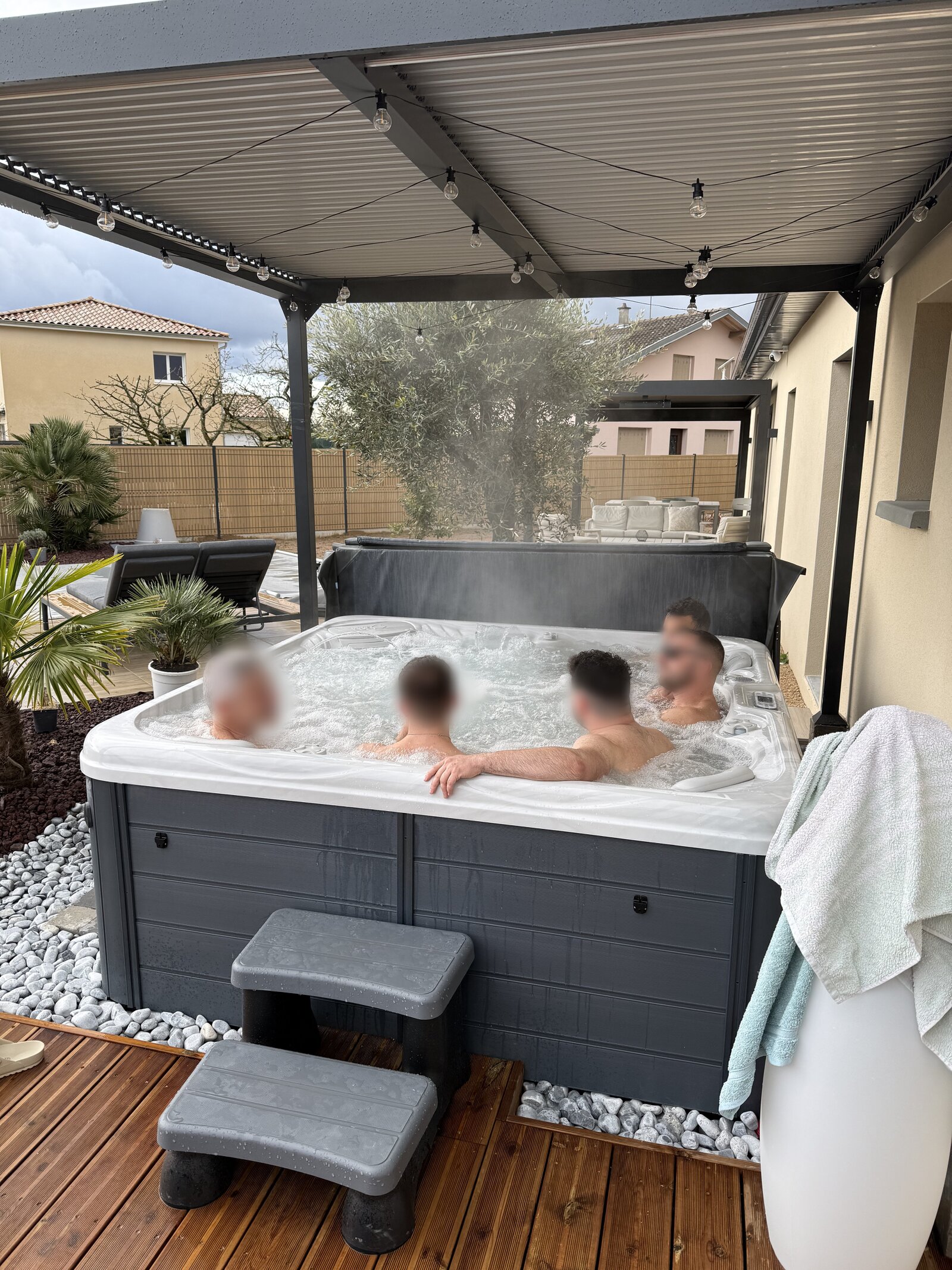 Guests relaxing together in the hot tub.