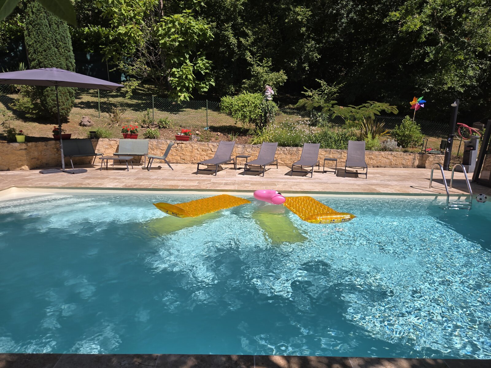 The pool area where naturism is permitted.