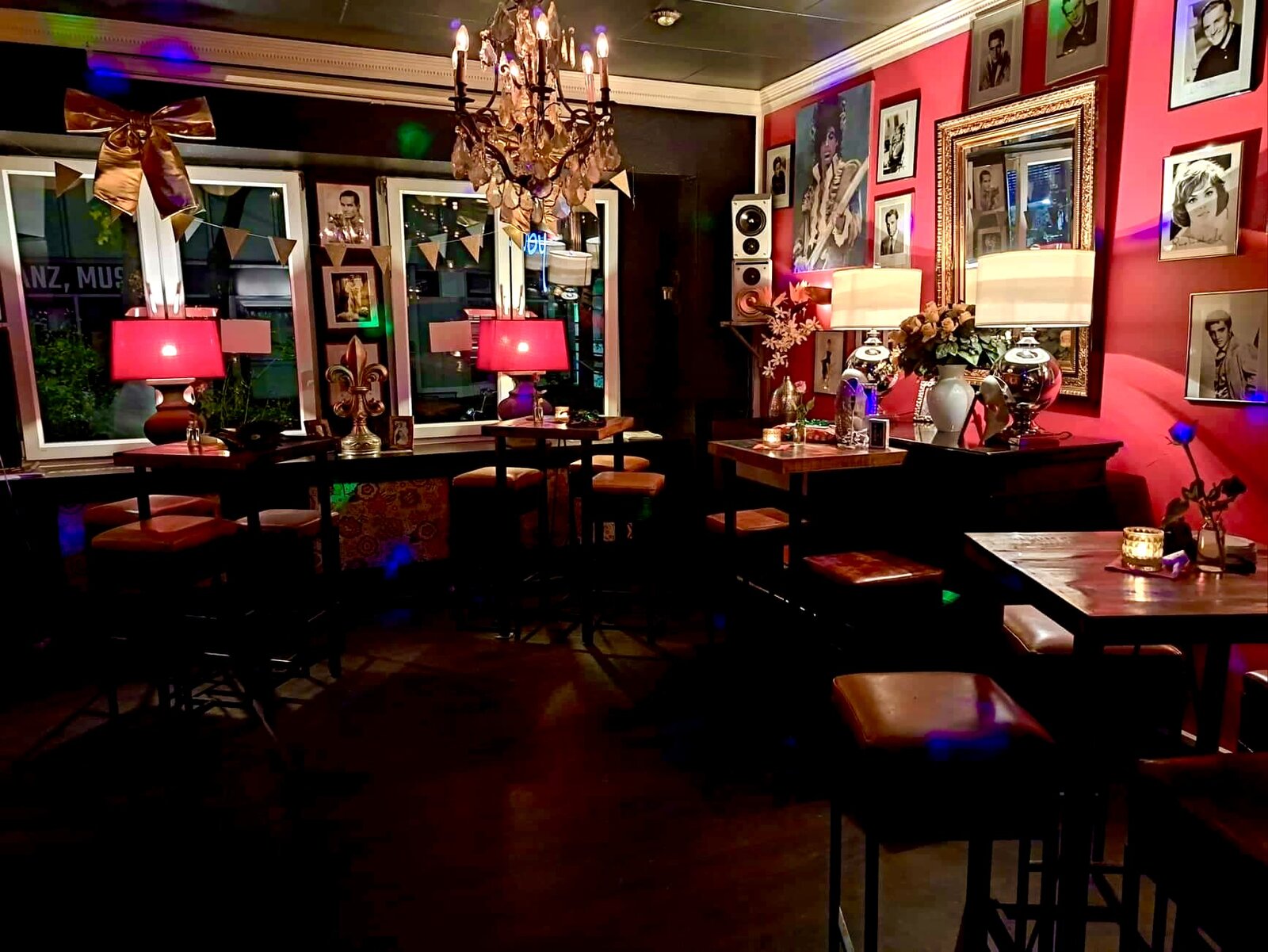 The front lounge decorated with party bunting and coloured lights.